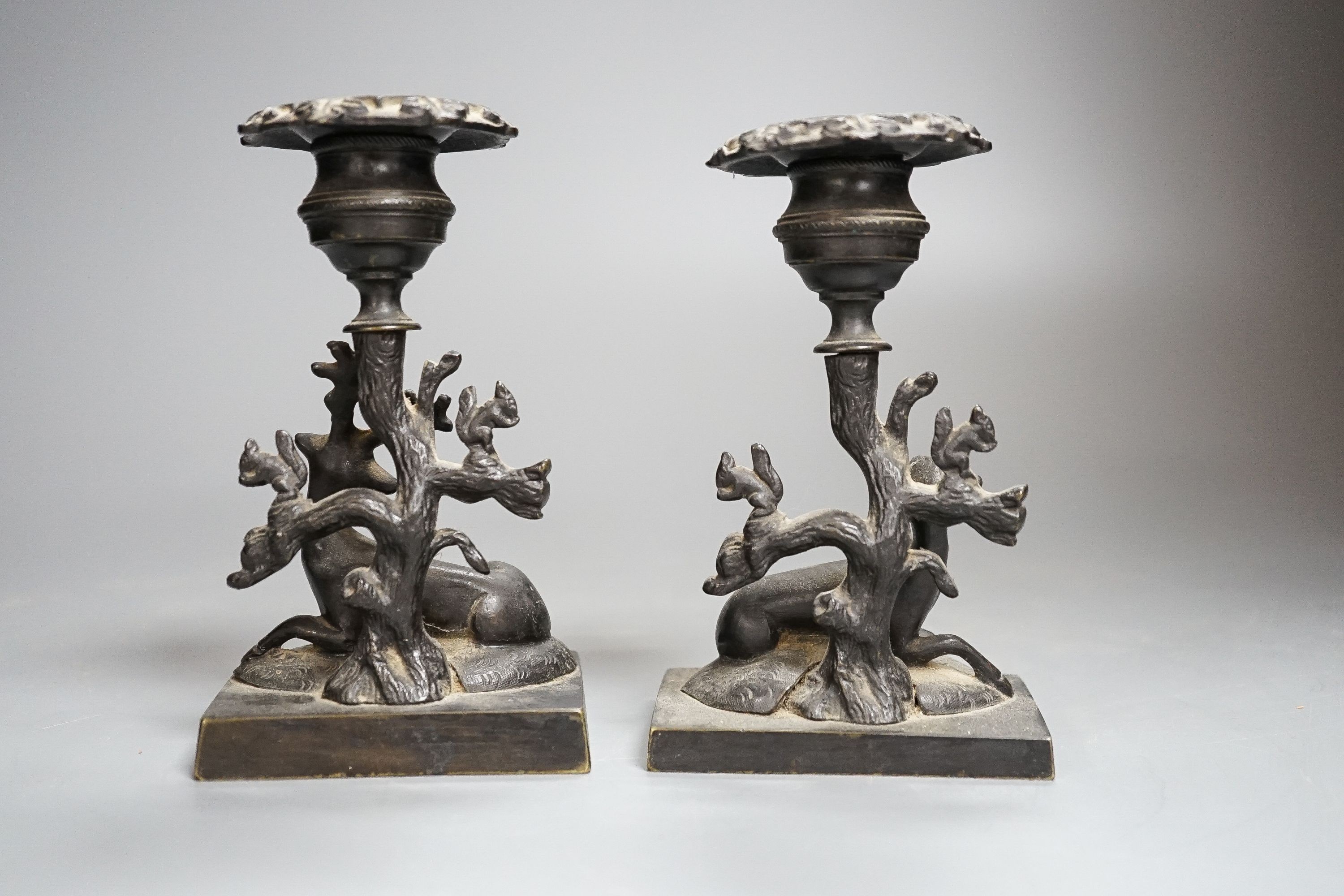 A pair of 19th century bronze ‘stag and doe’ dwarf candlesticks 14cm